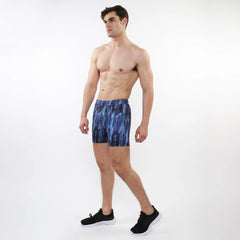 Blue tie-dye printed mesh stretch performance shorts with snug fit and elastic waistband for athletic use