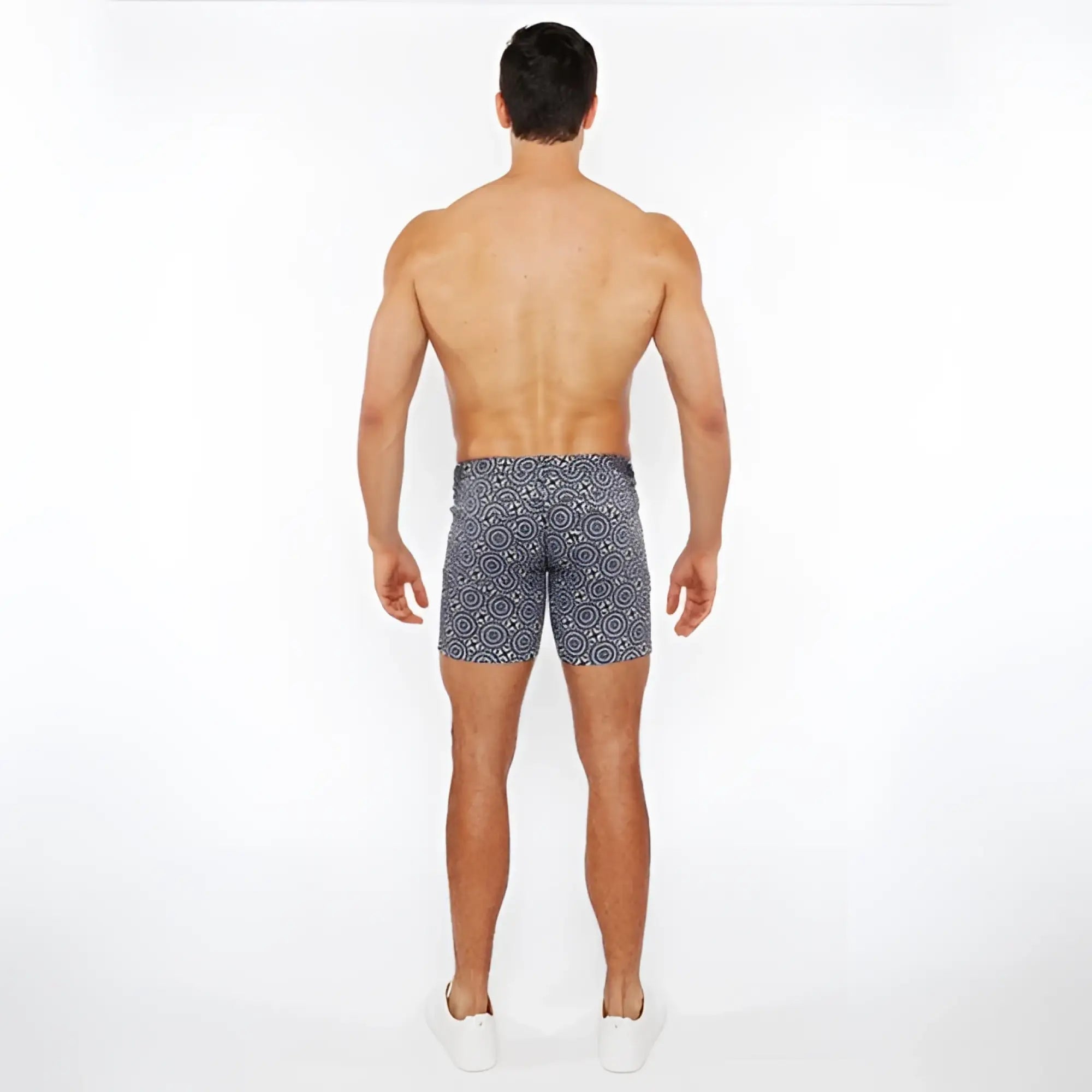 Men’s navy blue printed stretch knit shorts with white geometric pattern ideal for swim and casual wear
