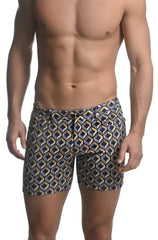 Printed stretch knit short swim trunks in navy and gold with a geometric pattern for men