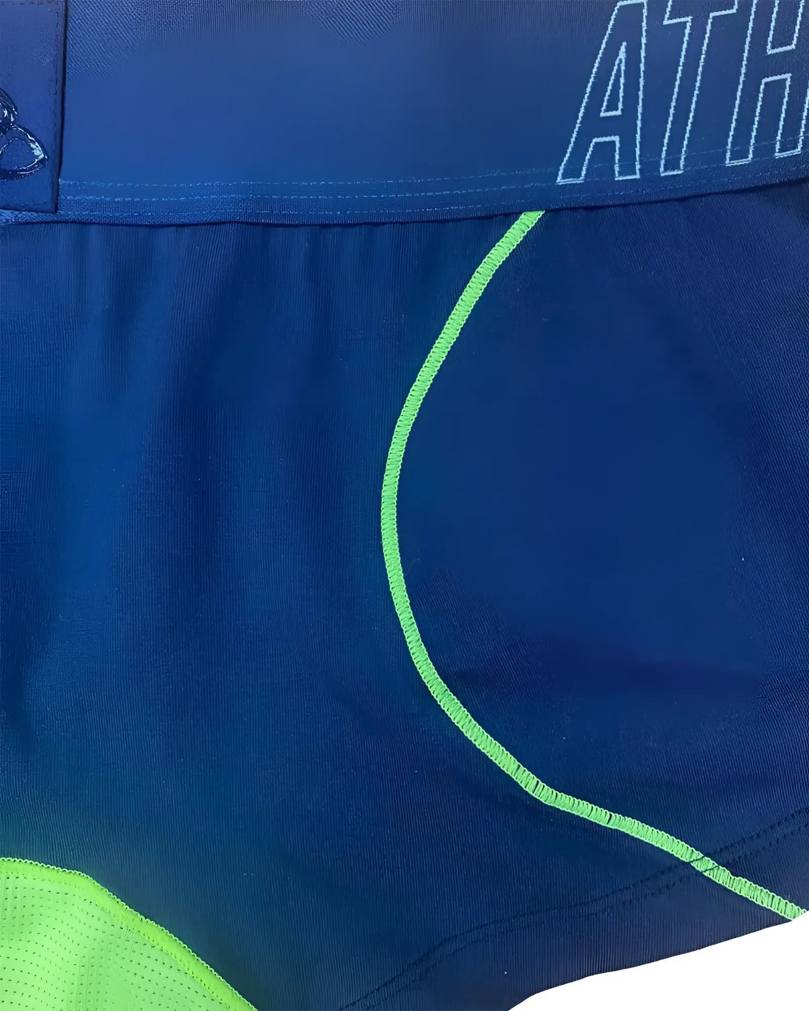 Blue athletic shorts with neon green stitching and mesh paneling for workout by Private Structure navy ranger