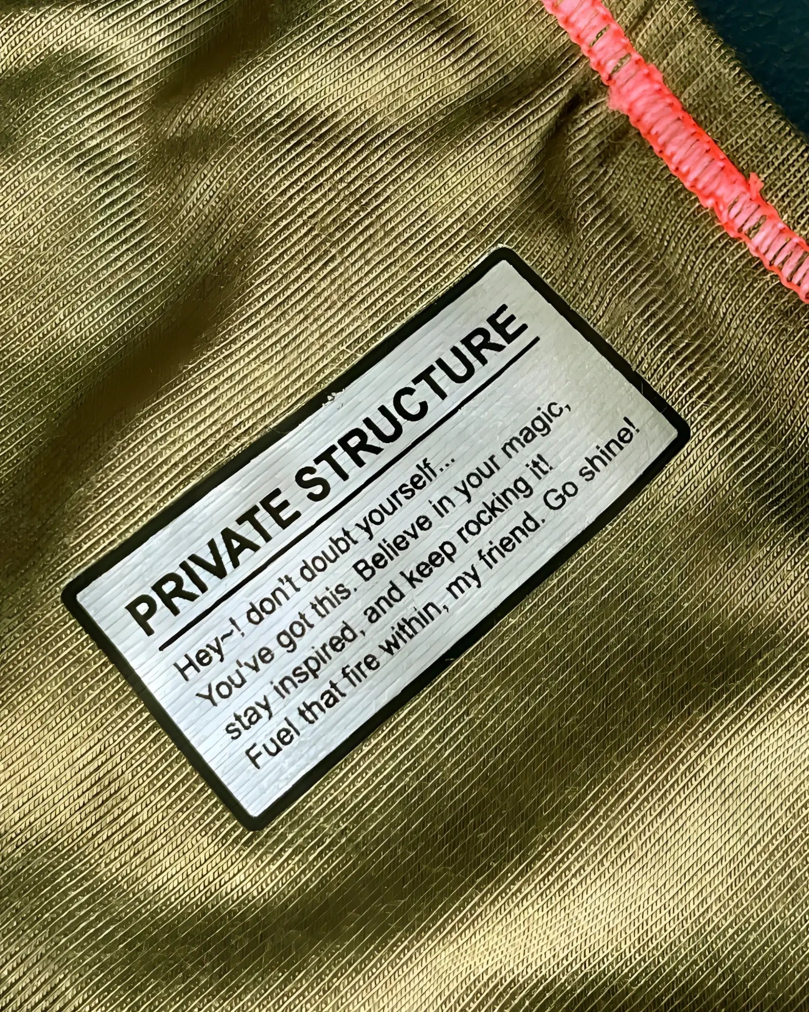 Olive green textured fabric of private structure epus4563 prime eutopia bikini brief with black-bordered silver label