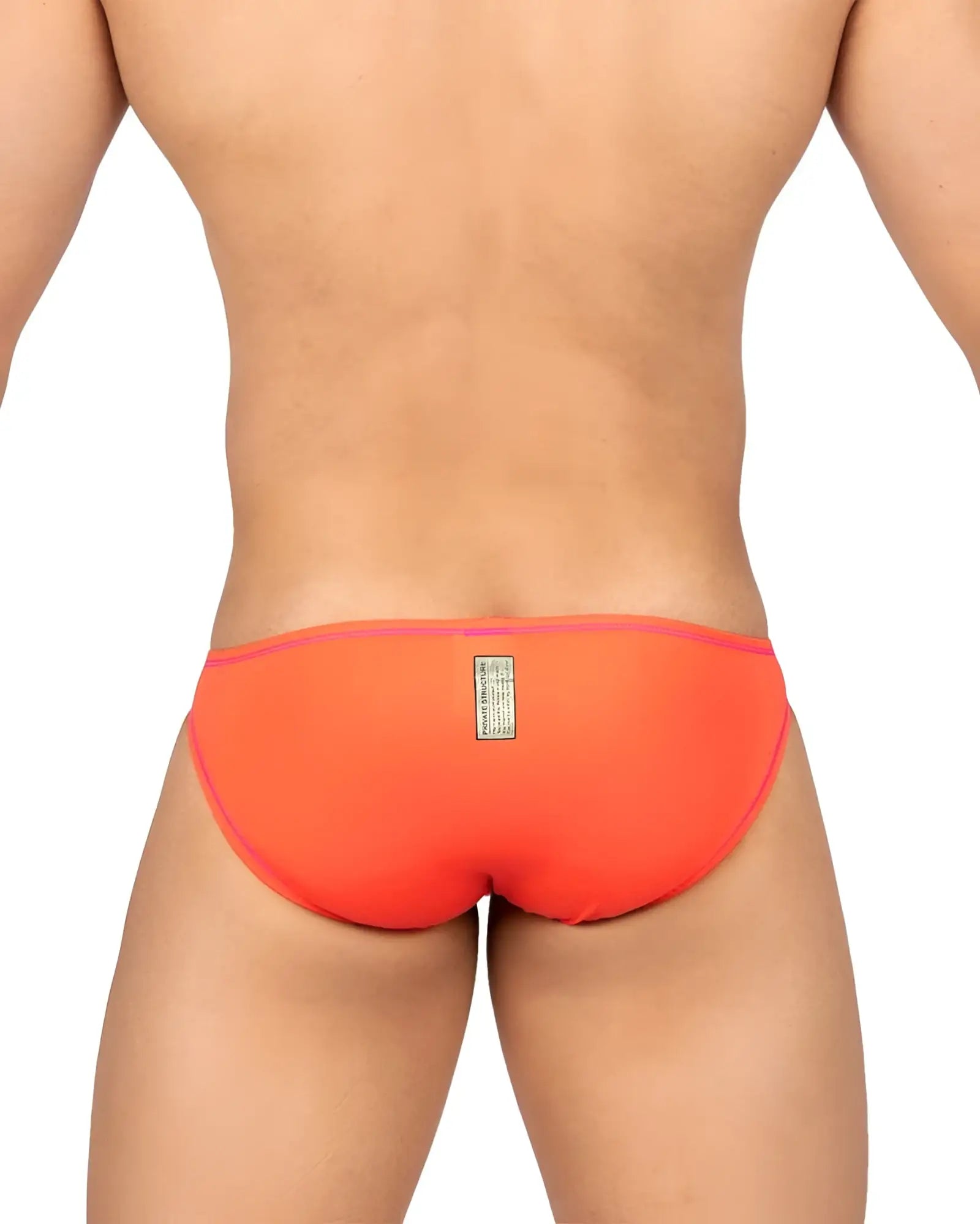 Back view of vibrant orange private structure epus4563 prime eutopia bikini brief with subtle pink trim and label