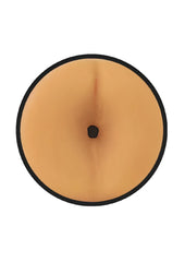 Tan silicone belly button cover with black border and central hole for prowler red manhole stroker use