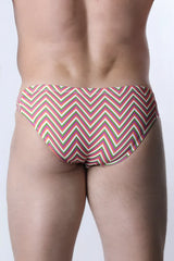 Pulse swim brief vibrant zigzag-patterned swim trunks in pink green and cream for beach and pool use