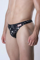 Pulse swim thong black briefs with star pattern and red and white Value brand logo on the waistband