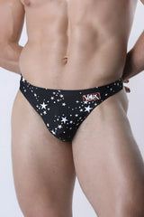 Black men’s briefs with star pattern and red vaux label on waistband from pulse swim thong collection