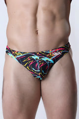 Vaux pulse swim thong featuring neon pink yellow and cyan abstract lines on black for men’s swimwear