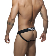 Black push-up mesh jockstrap thong with white addicted brand lettering on waistband showing back side