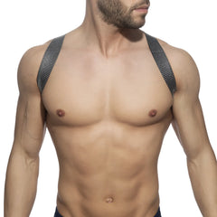 Black mesh shoulder straps with subtle grid pattern on pushpin spider harness back side