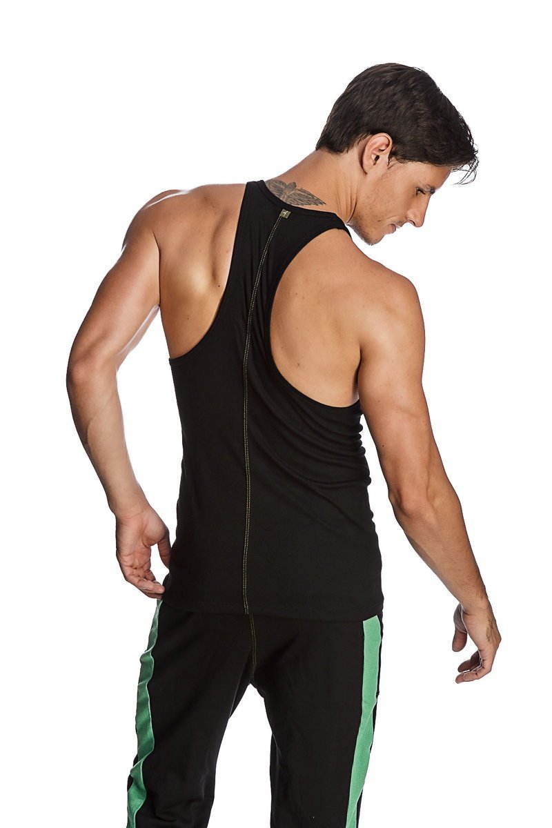 Back view of a black racer-back yoga tank with central zipper paired with matching pants with green side stripes