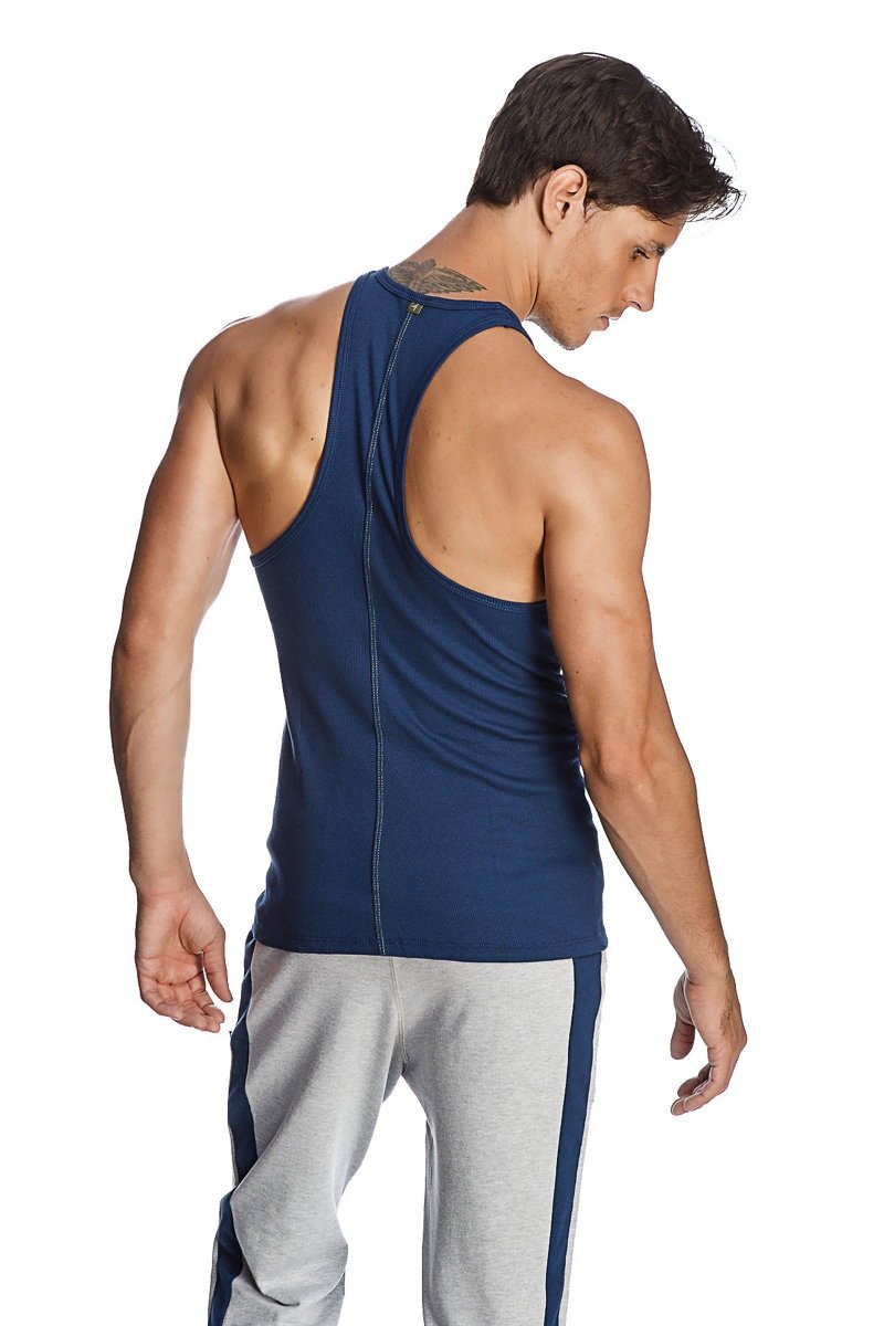 Navy blue racer-back yoga tank with back zipper and seam detailing designed for athletic wear