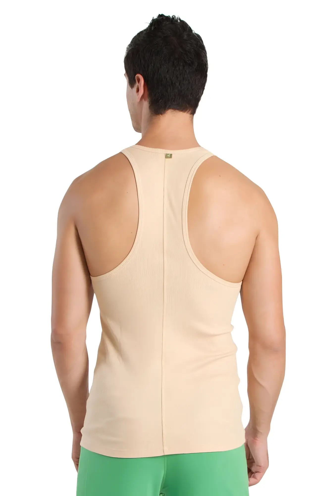 Beige racer-back yoga tank top with central seam and subtle brand tag at neckline ideal for workouts