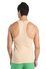 Beige racer-back yoga tank top with central seam and subtle brand tag at neckline ideal for workouts
