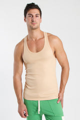 Beige racer-back yoga tank with sleeveless design rounded neckline and fitted silhouette for activewear