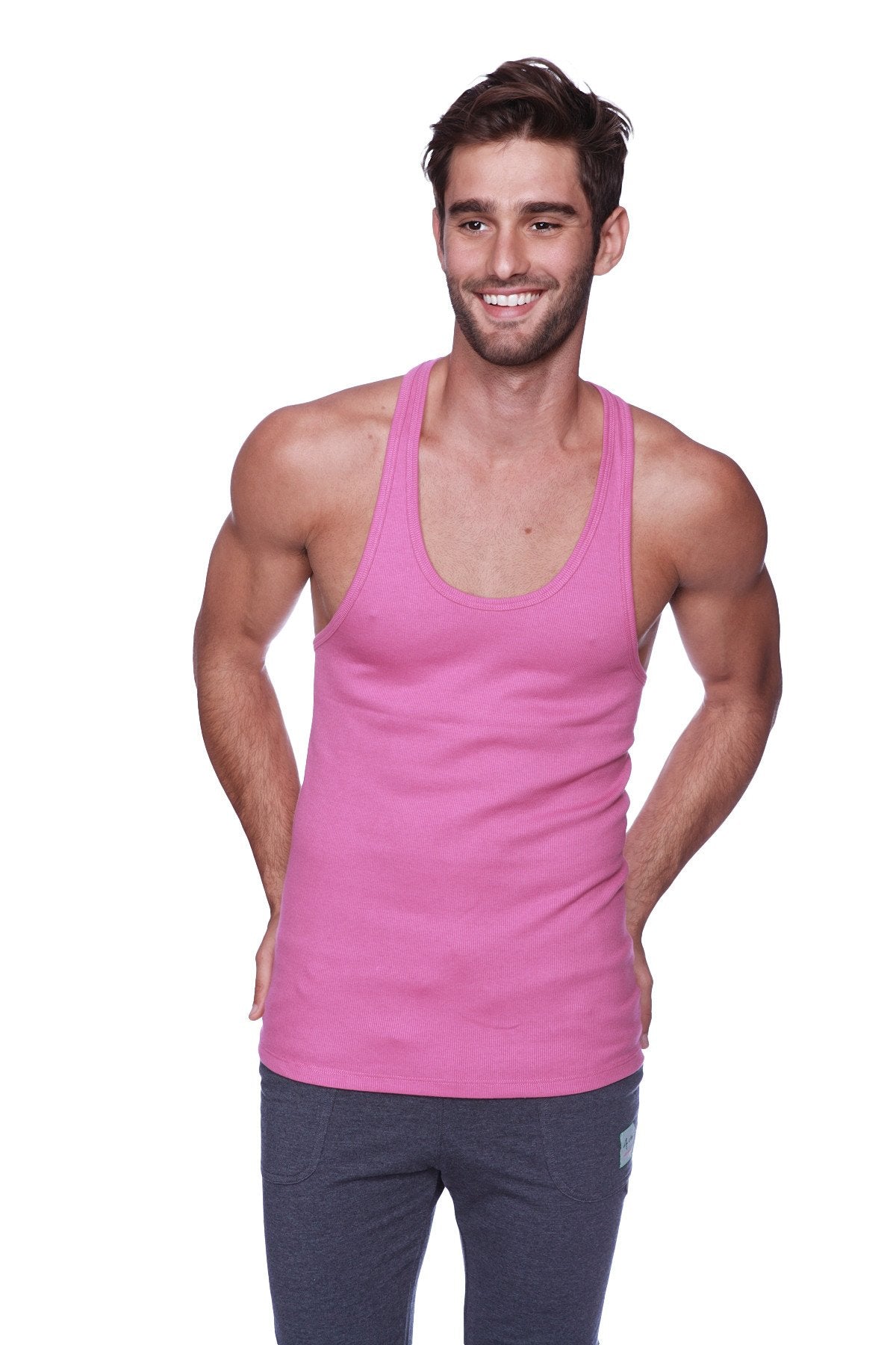 A vibrant berry pink racerback yoga tank top with a classic scoop neckline and soft sleeveless fabric