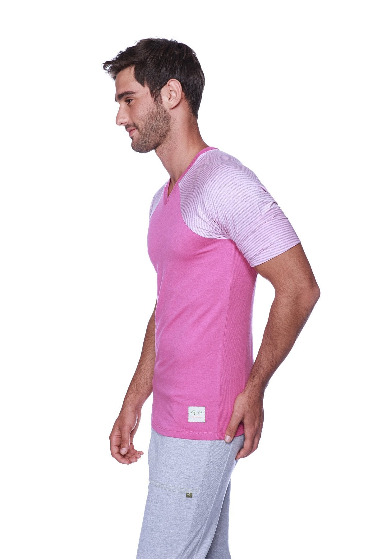 A vibrant pink and light purple striped raglan sleeve t-shirt with subtle textured pattern called raglan virtual crew neck berry w pink and grey stripe