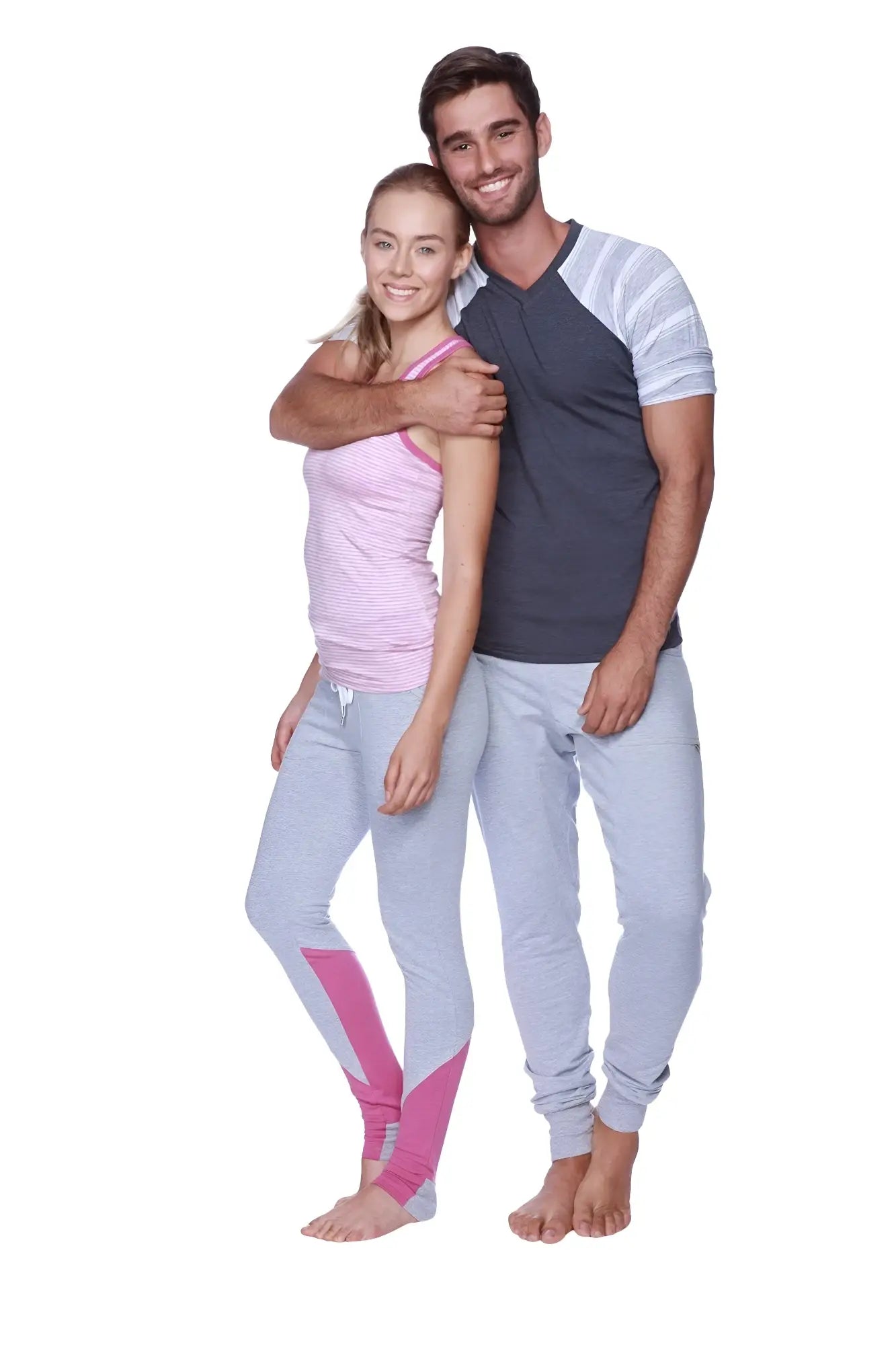 A pair of light gray athletic leggings with vibrant pink side panels shown from the back for active wear