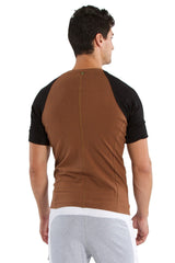 Back view of a brown and black raglan sleeve athletic tee with a fitted back design called raglan virtual crew neck chocolate w black