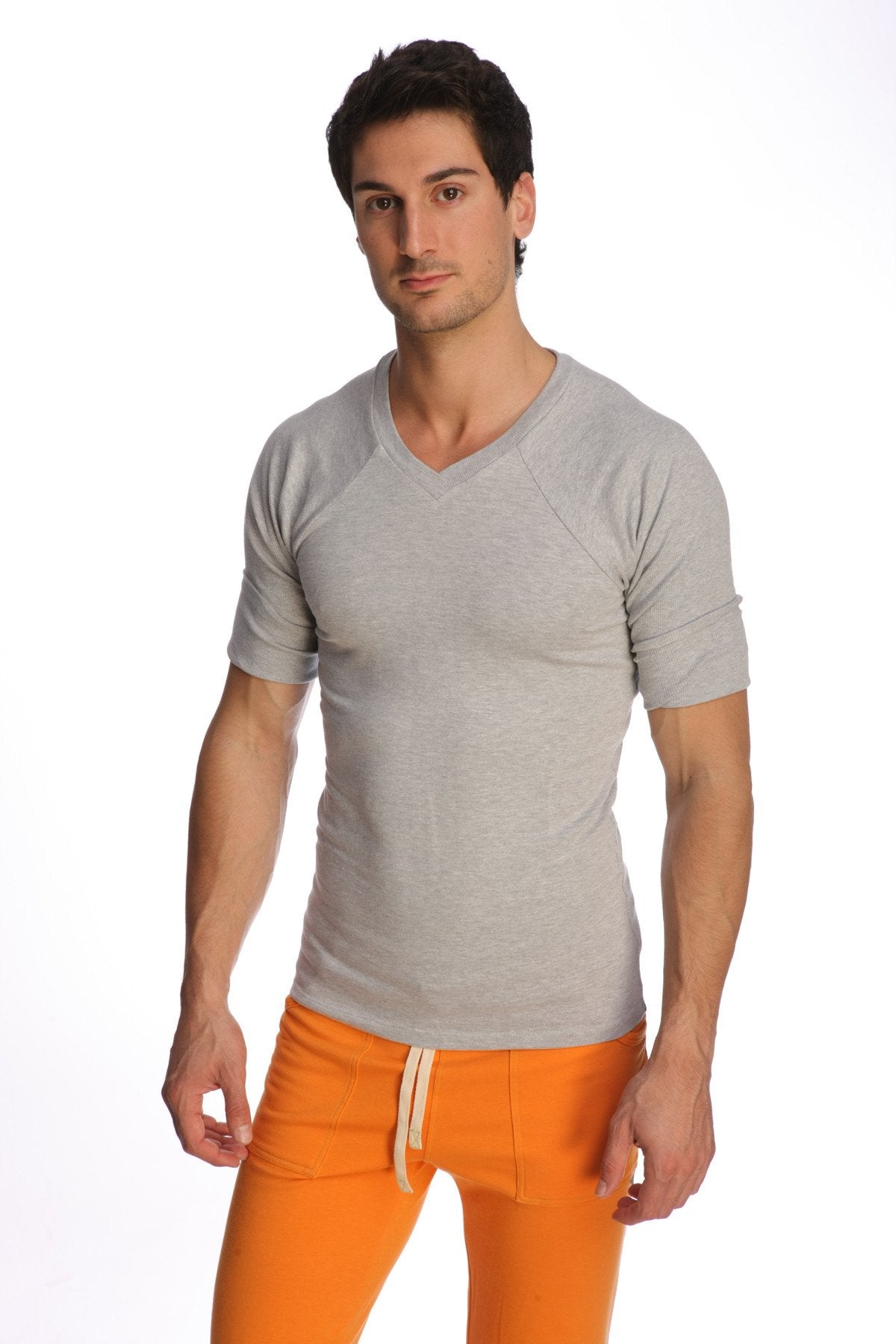 A slim-fit gray v-neck short-sleeve t-shirt with subtle ribbed sleeves called raglan virtual crew neck heather grey