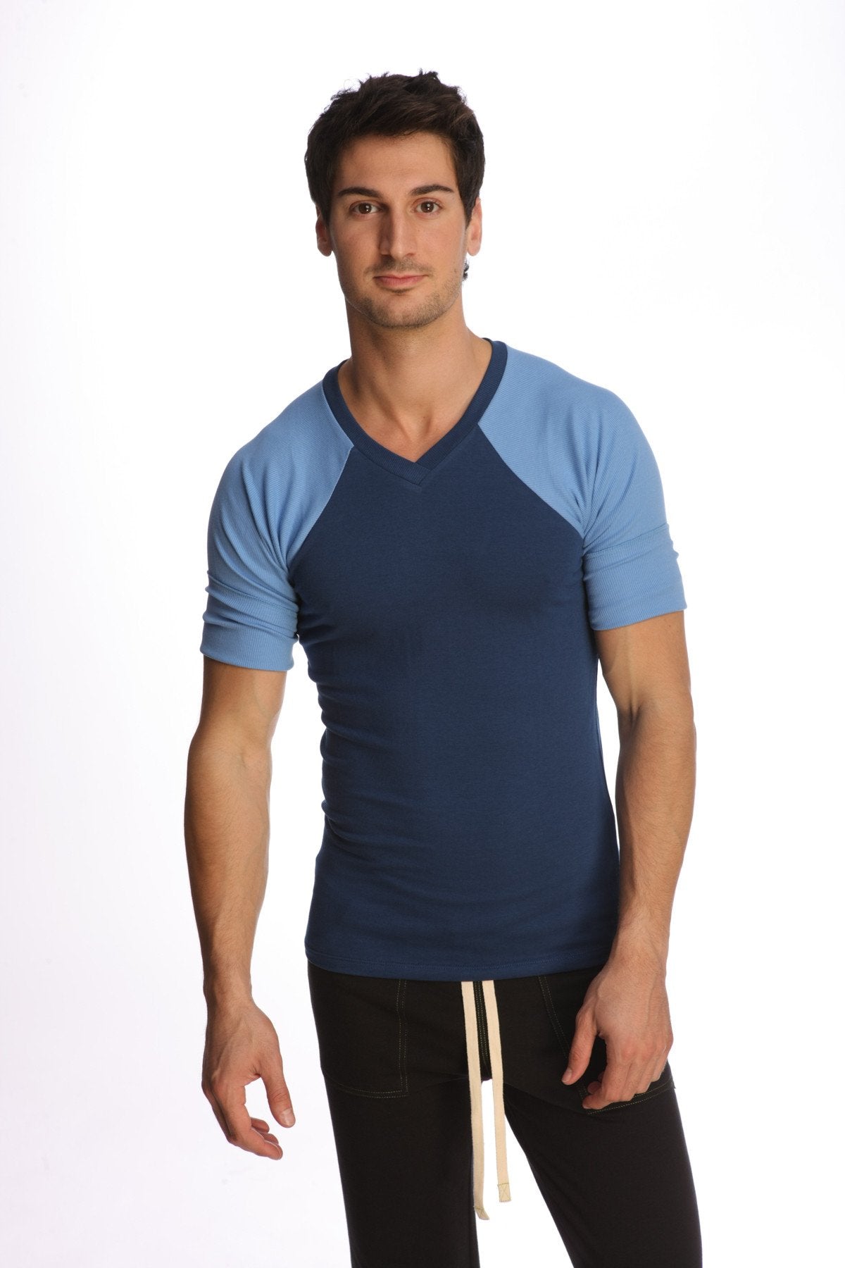 A navy blue and light blue raglan sleeve v-neck t-shirt with subtle ribbed texture called raglan virtual crew neck royal blue