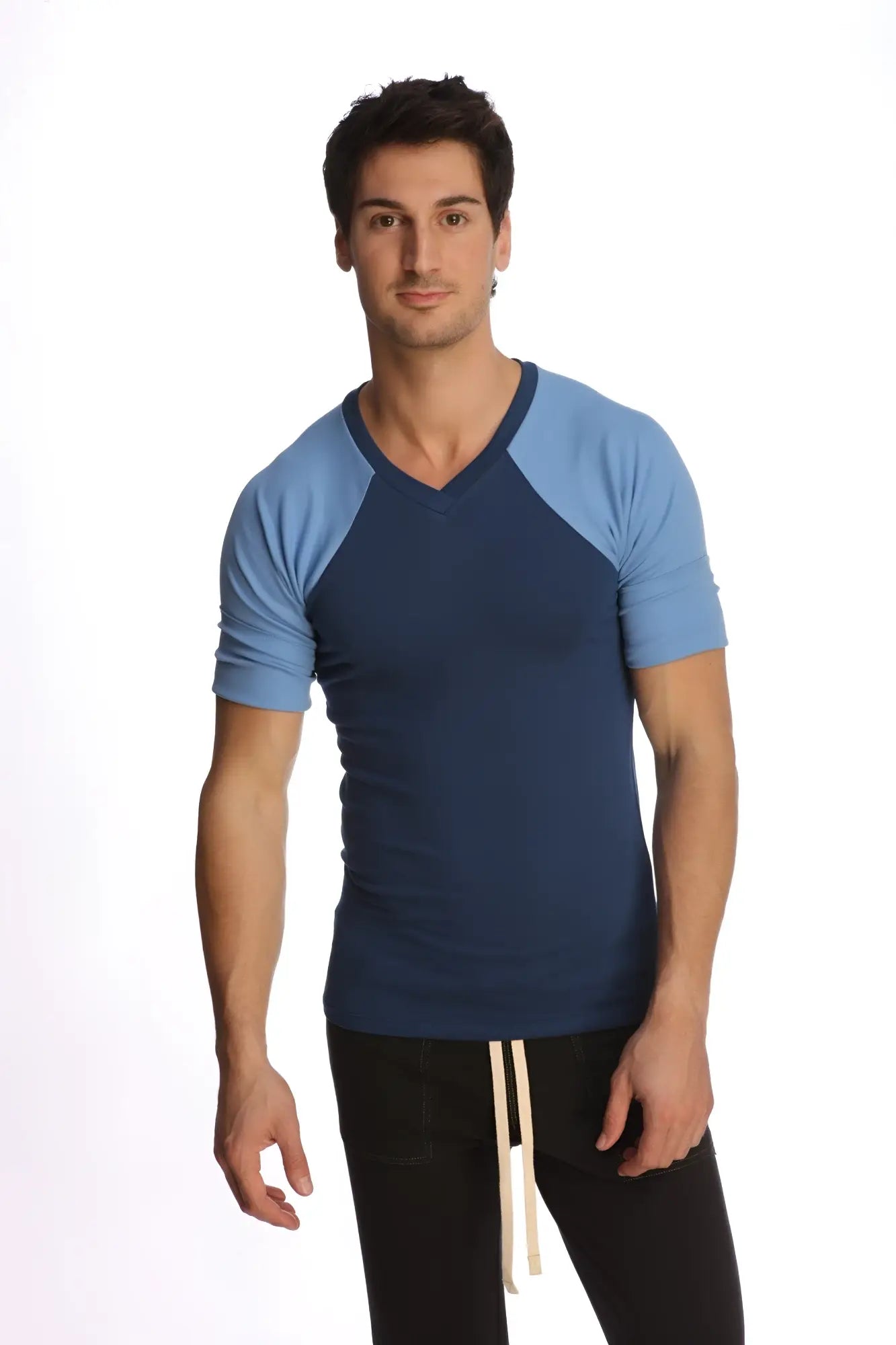 A navy blue and light blue raglan sleeve v-neck t-shirt with subtle ribbed texture called raglan virtual crew neck royal blue