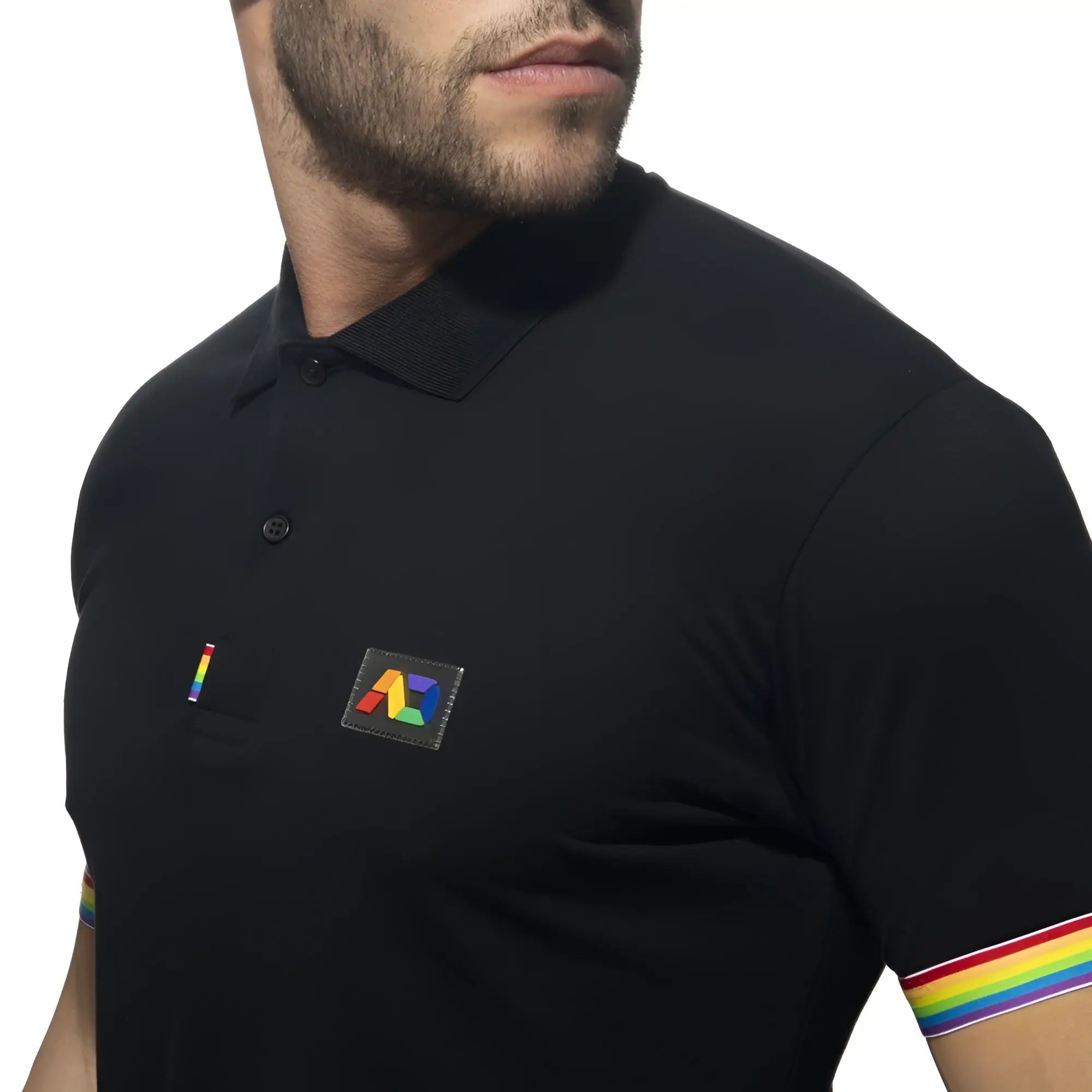 Black polo shirt with rainbow-colored trim on sleeves and matching rainbow logo patch on chest called rainbow polo shirt