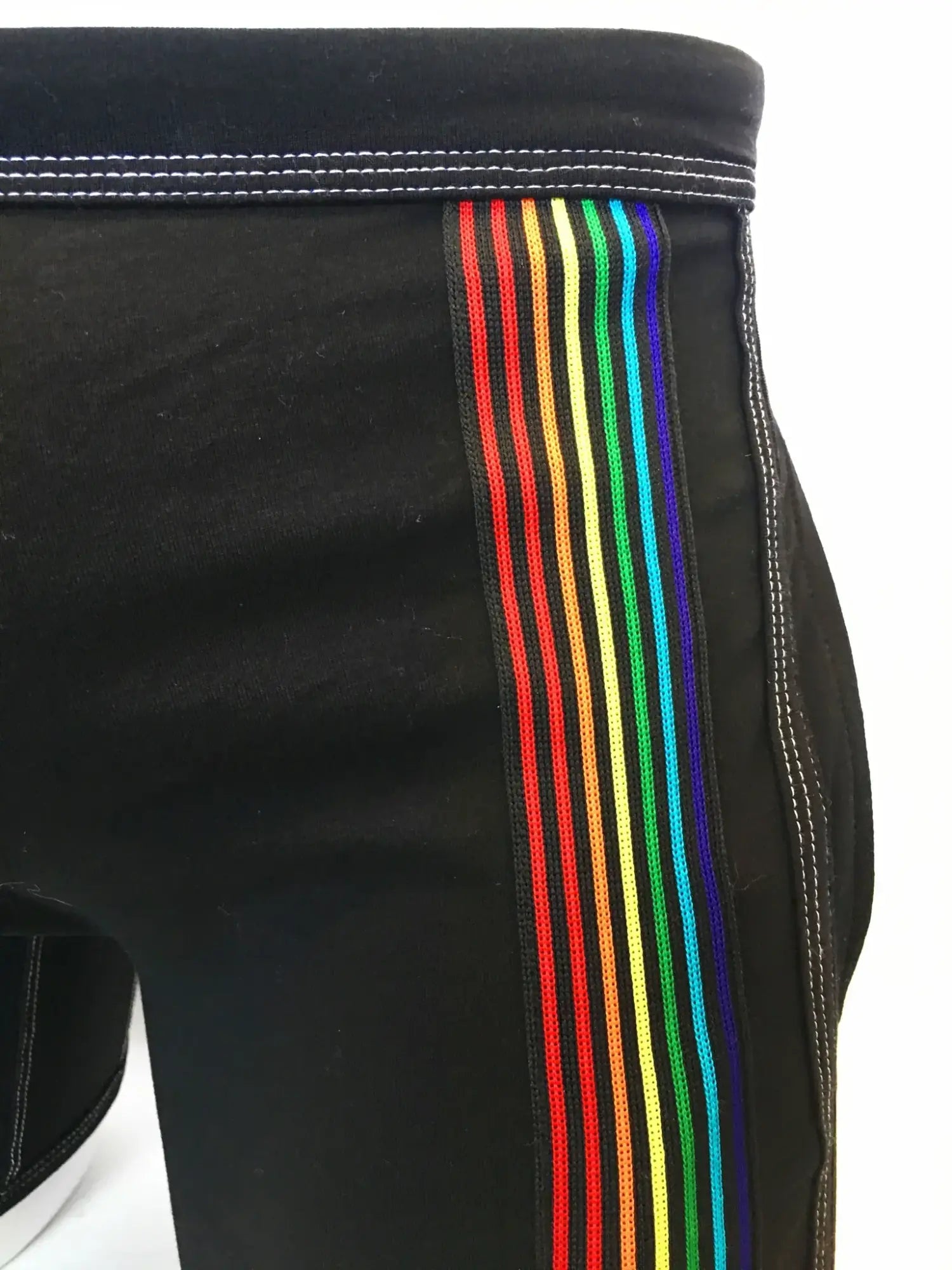 Black athletic shorts with a vibrant rainbow stripe down the side designed for comfortable activewear use