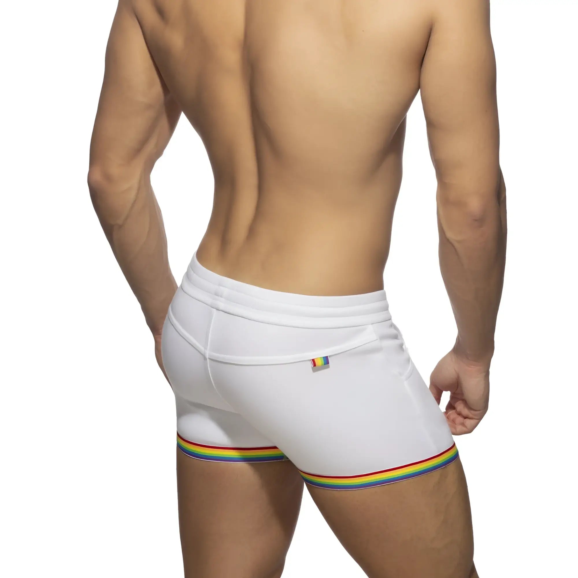 White cotton athletic shorts with rainbow stripe trim and small rainbow flag logo on waistband rainbowl tape cotton short