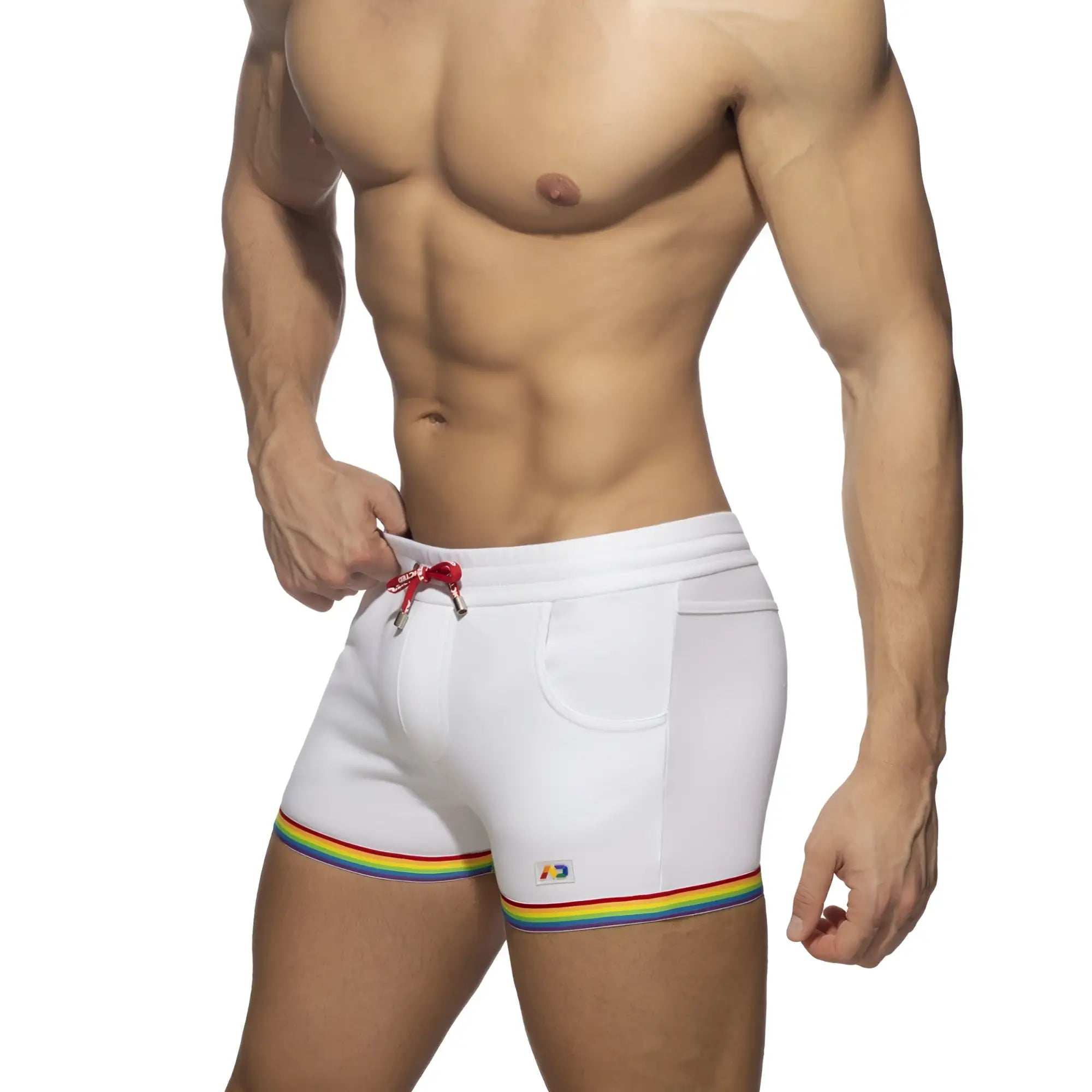 White cotton swim trunks with rainbow tape trim and red drawstring called rainbow tape cotton short