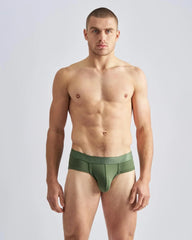 Olive green men’s reign brief made of smooth stretchy fabric with a subtle brand logo on the waistband