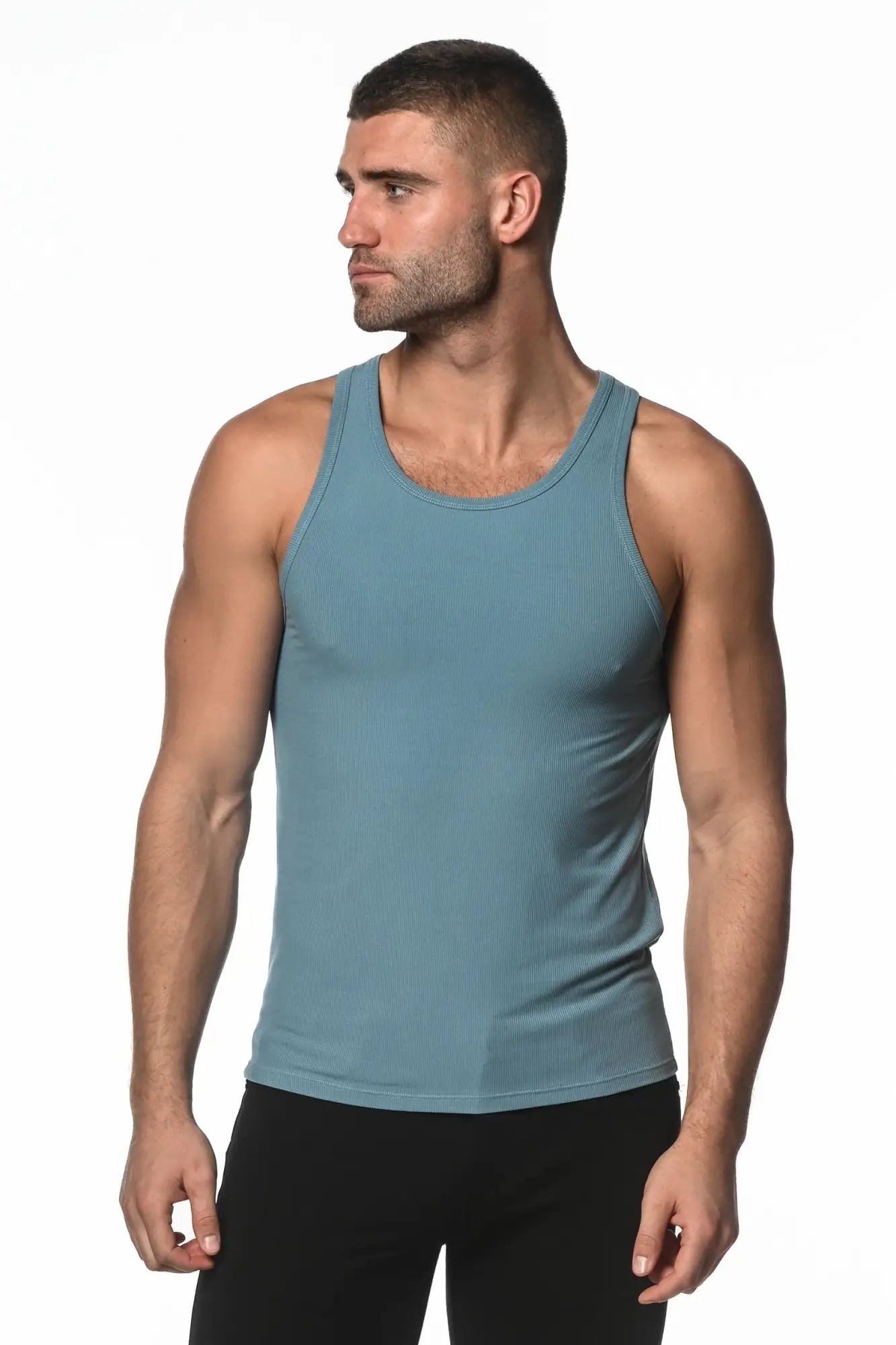 A sleek rib modal tank top in teal with a ribbed texture, classic round neckline, and fitted silhouette
