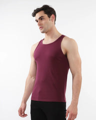 A maroon rib stretch tencel cotton tank top with a sleeveless design and smooth form fitting fabric