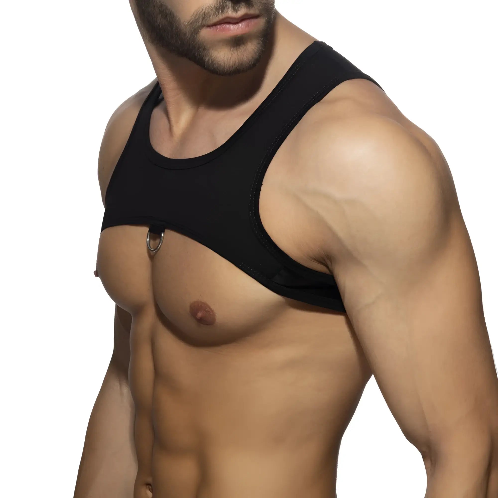 Black sleeveless top ring plan harness with metallic ring detail at center front for stylish layering and edgy looks