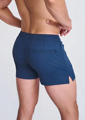 Navy blue riviera seersucker swim shorts with mesh lining side zip pocket and hem cutout in textured fabric