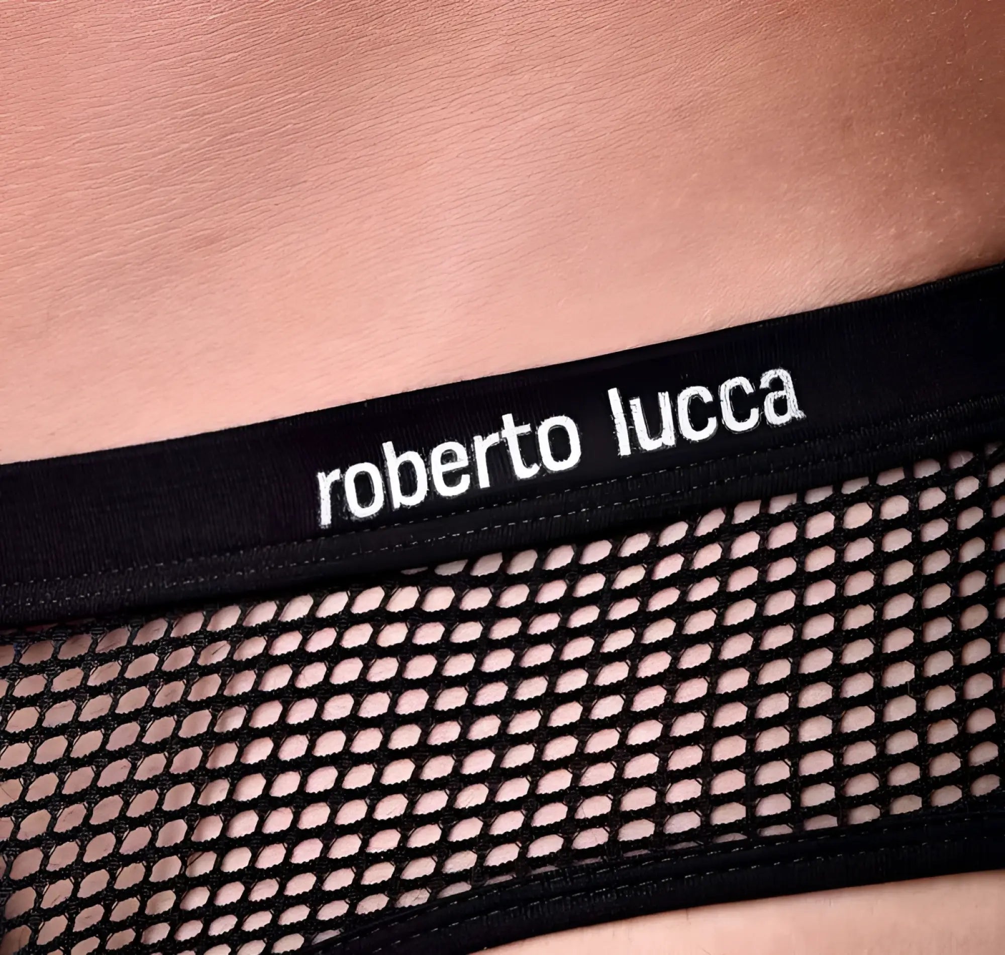 Black mesh trunk underwear with solid black elastic waistband featuring white embroidered roberto lucca branding size l