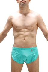 Turquoise running shorts joe green with snug fit and small red logo on waistband designed for athletic use