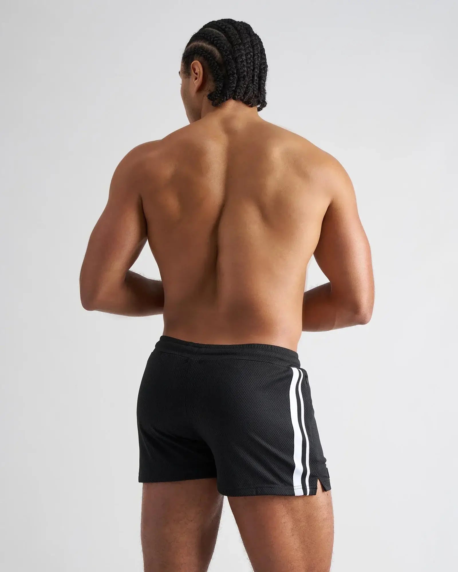 Black s.s.c. fraternity 3 inch mesh shorts with two vertical white stripes along the side for athletic use