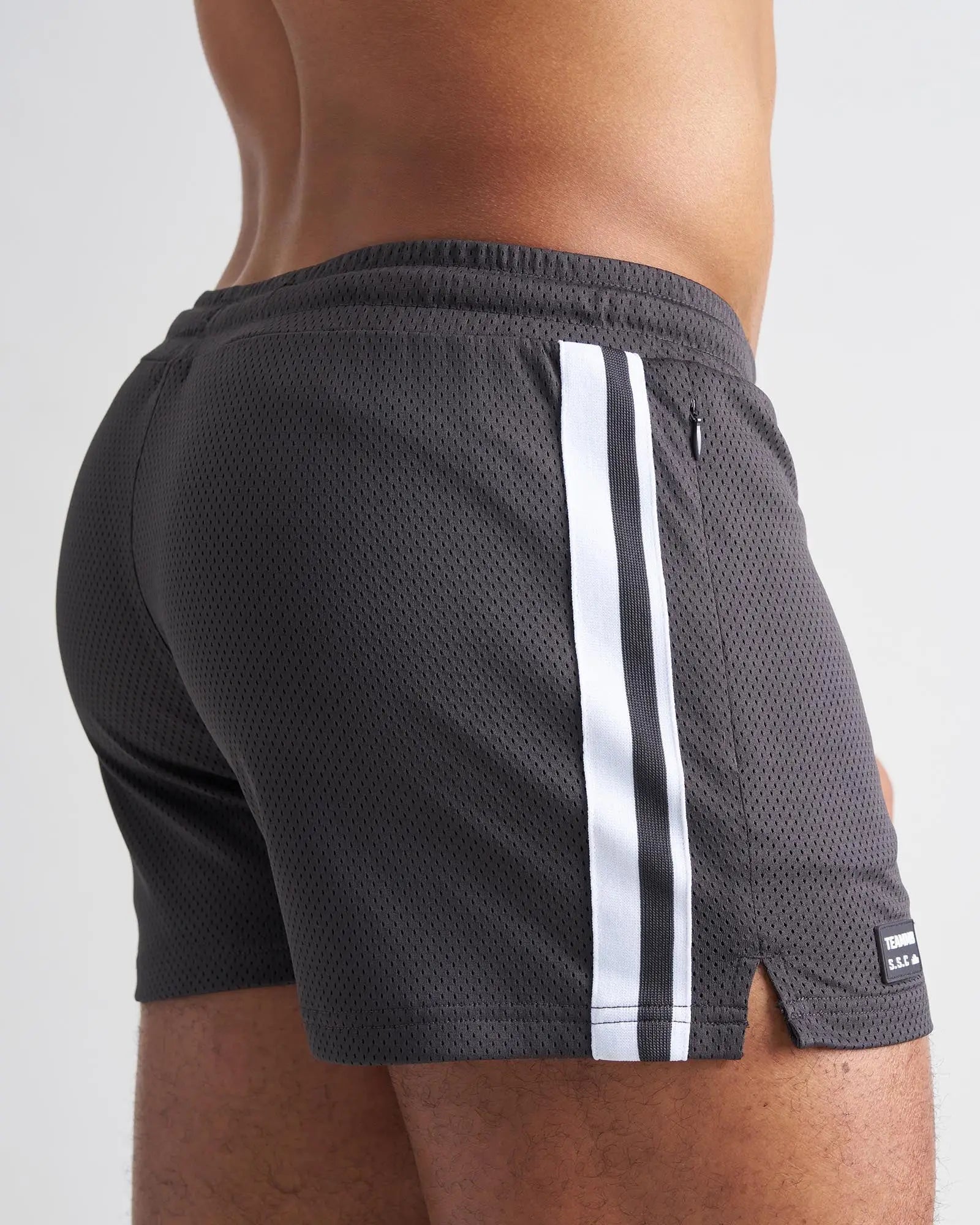 Dark gray s.s.c. fraternity 3 mesh shorts with white vertical stripes and a black brand tag on the hem