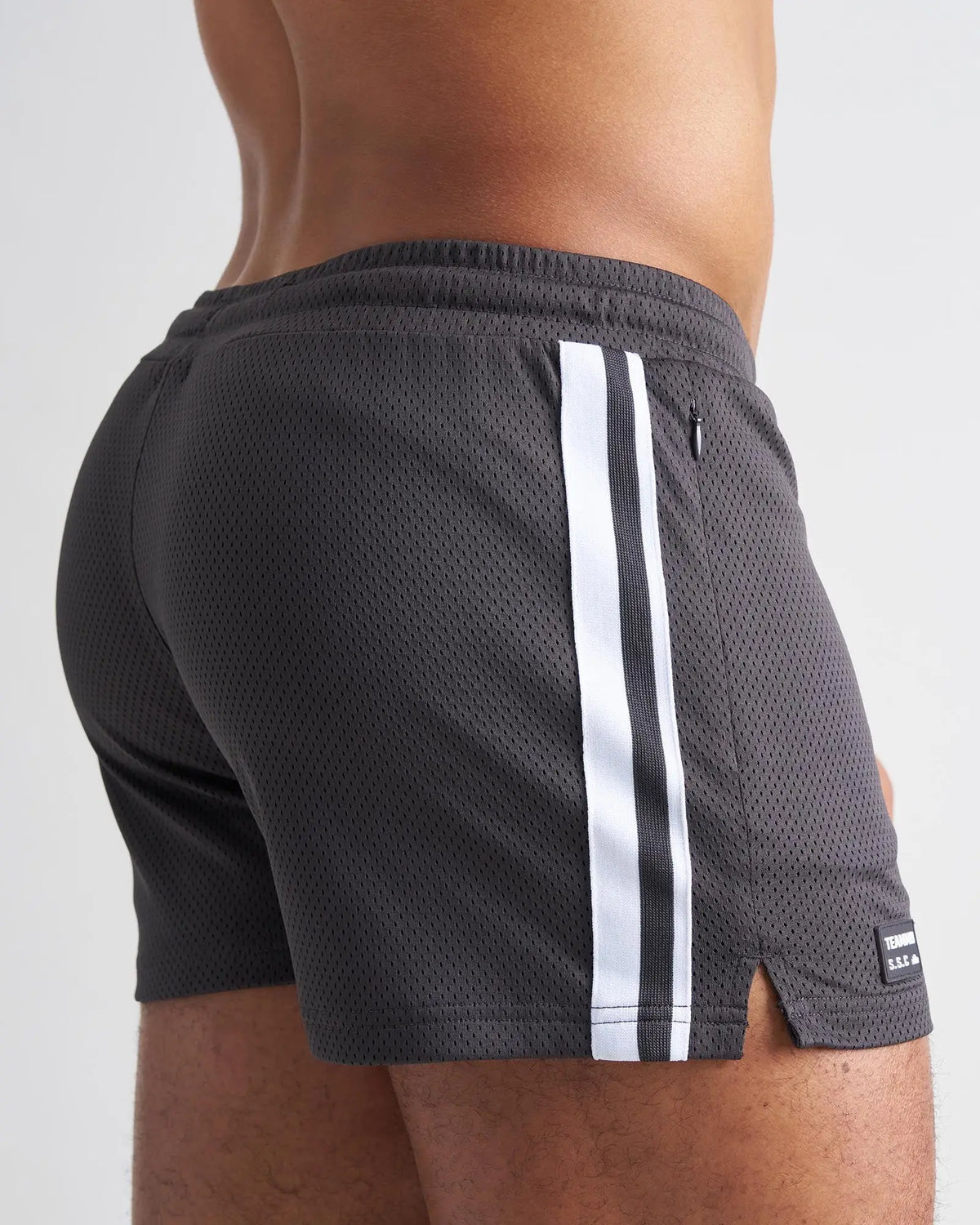 Dark gray s.s.c. fraternity 3 mesh shorts with white vertical stripes and a black brand tag on the hem