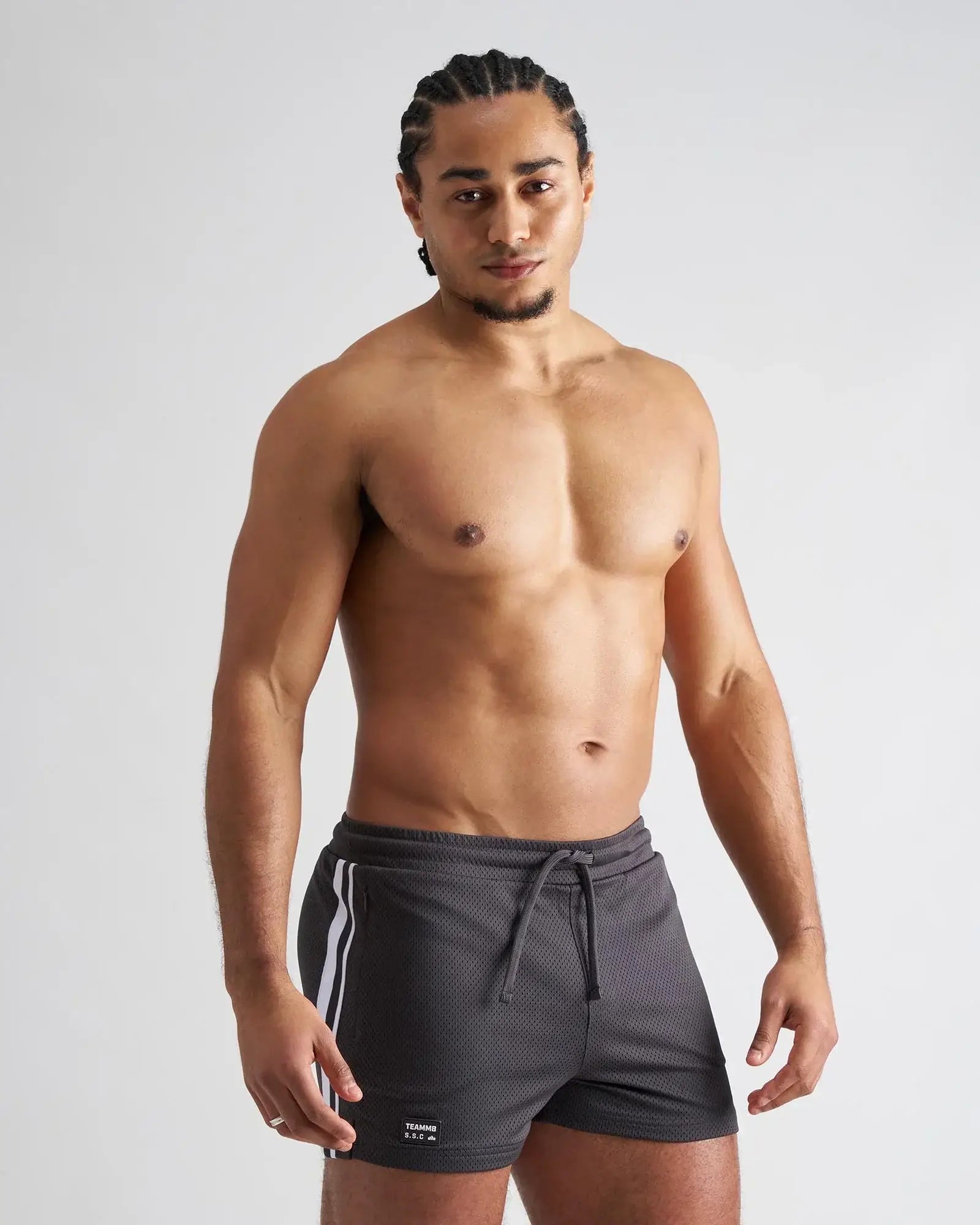Dark gray s.s.c. fraternity 3 mesh athletic shorts with white side stripes and drawstring waistband