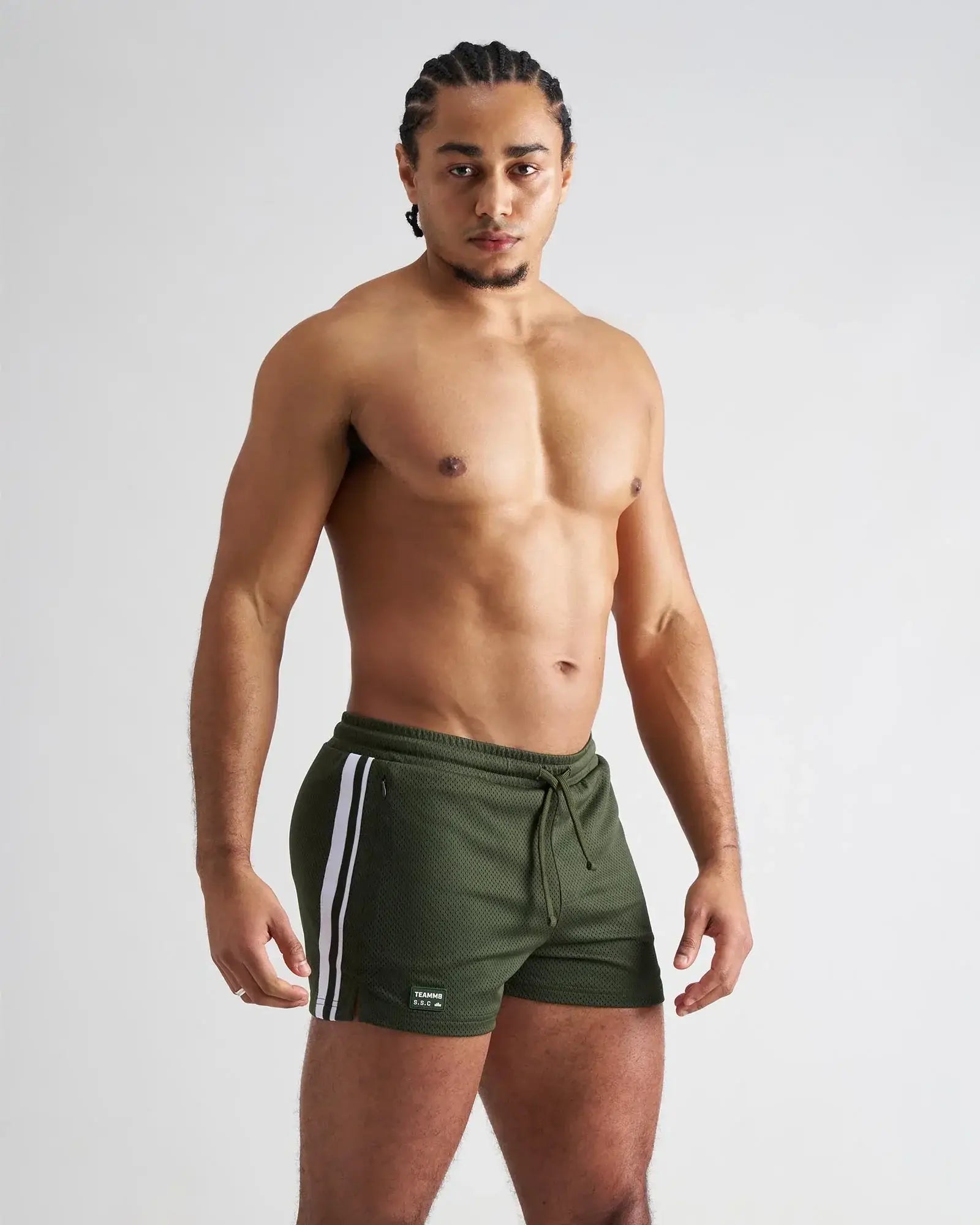 Olive green mesh athletic shorts with white side stripes and drawstring waistband s.s.c. fraternity 3 inch mesh short
