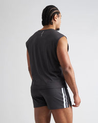 Black sleeveless s.s.c. mesh muscle tank showing back side with textured mesh fabric and subtle branding