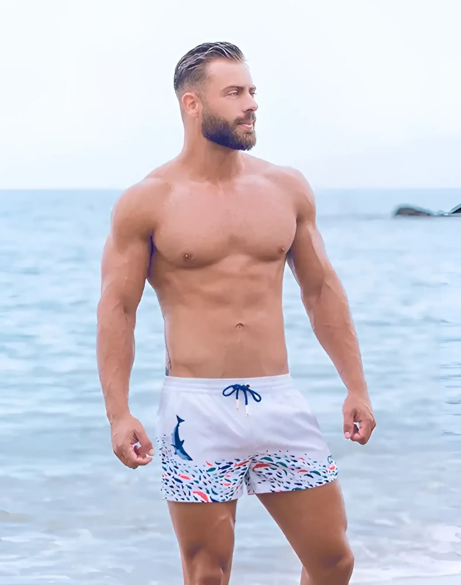 White swim trunks s50 seascape print swim short with blue dolphin graphic colorful fish pattern and navy drawstrings
