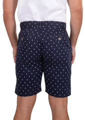 Dark navy sailboat print shorts with subtle white triangle pattern classic tailored fit and branded button details
