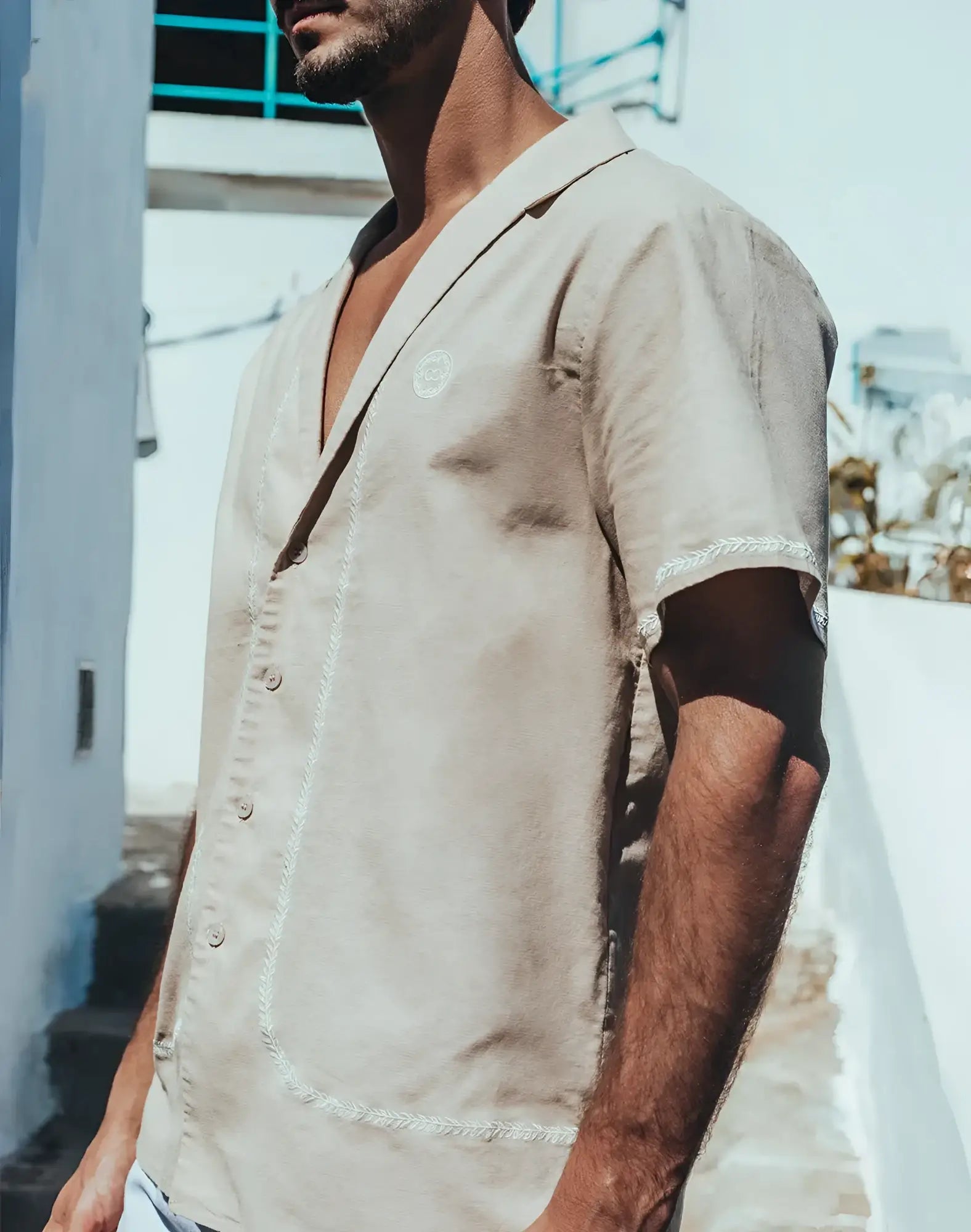 Santorini linen shirt beige short-sleeved button-up with white embroidered trim on placket and sleeve cuffs
