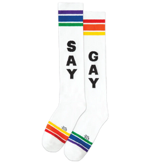 White knee high socks with rainbow stripes and black say gay text featuring a classic athletic design