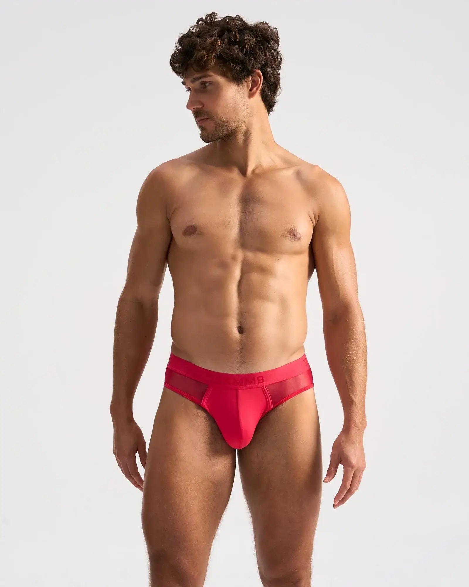 Bright red score sheer brief with form-fitting fit and sheer mesh panel on the back for a stylish look