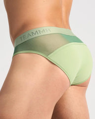 Mint green team8 men’s briefs with sheer mesh panel and elastic waistband from the score sheer brief line