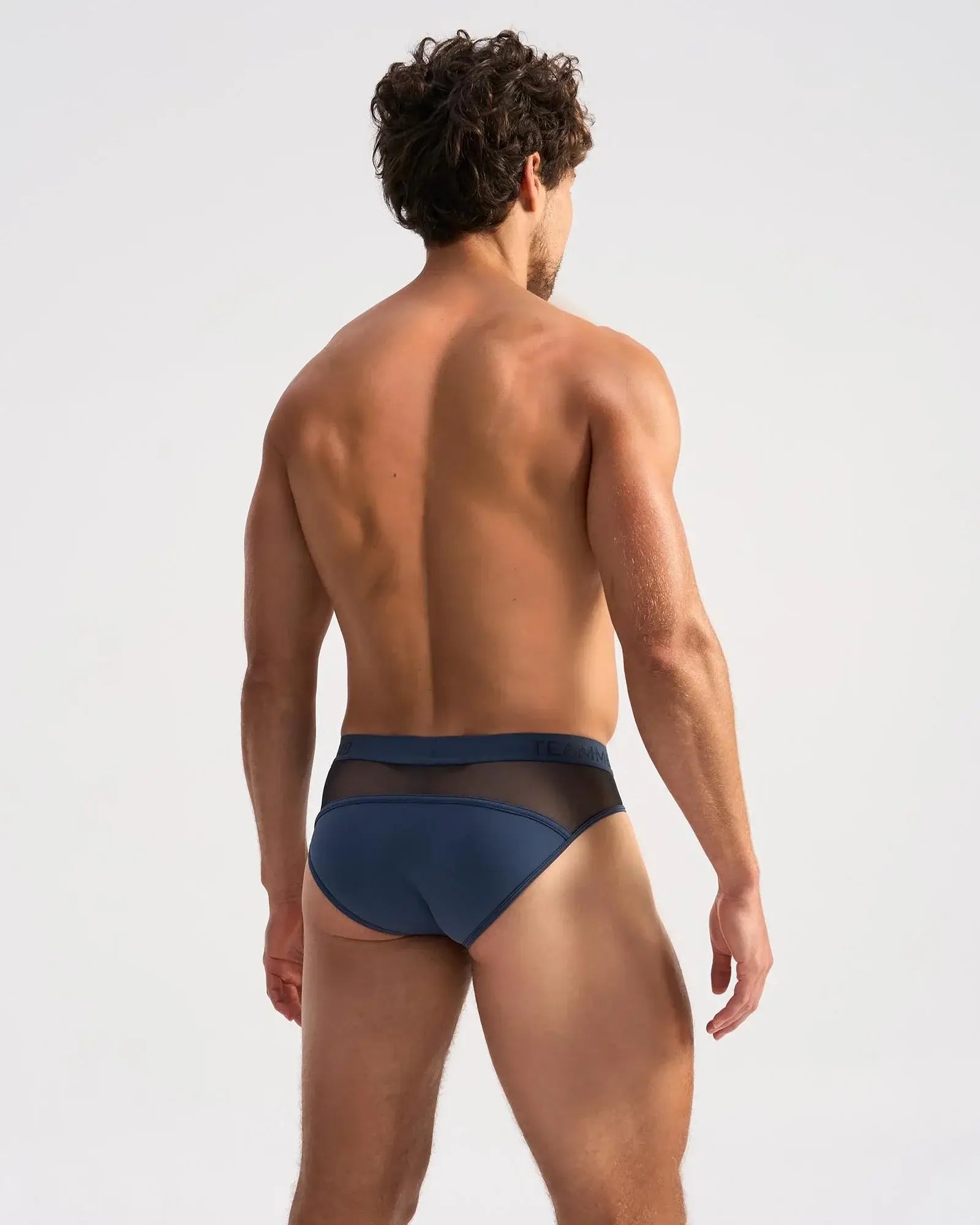 Navy blue score sheer brief with mesh trimming showcasing breathable lightweight fabric and modern design