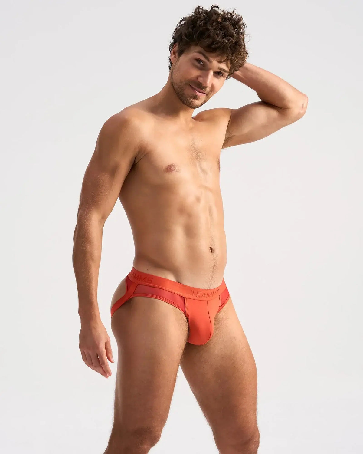Bright orange score sheer jock briefs with a sleek modern design and subtle branded waistband